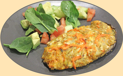 Baked Brinjal/Eggplant with a side salad. This is the Vegan Version made with non dairy  cheddar cheese.